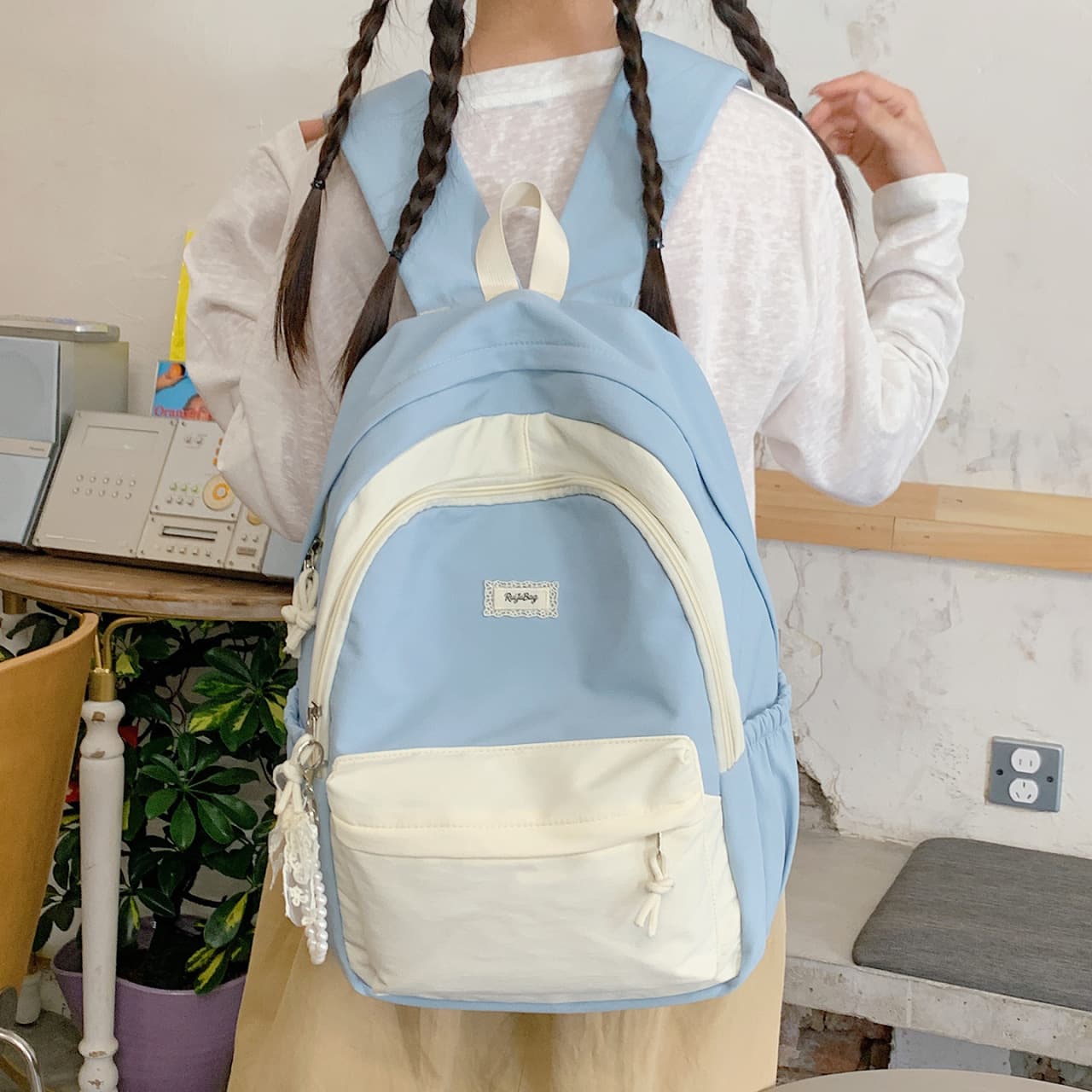 Cross-border contrasting color casual backpack lightweight travel outdoor small backpack Japanese style ins versatile commuter student school bag