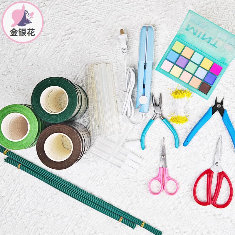Flower center pliers, glue, hot melt glue sticks, scissors, size 2 flower stems, flower center tools, floral tape, alcohol, twist sticks