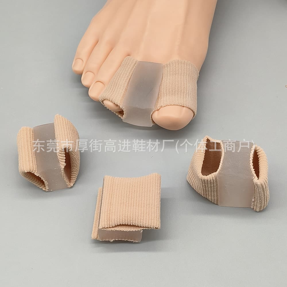 Fiber tube double-hole toe separator for assisting in correcting overlapping toe symptoms, soft and pain-preventive correction separator