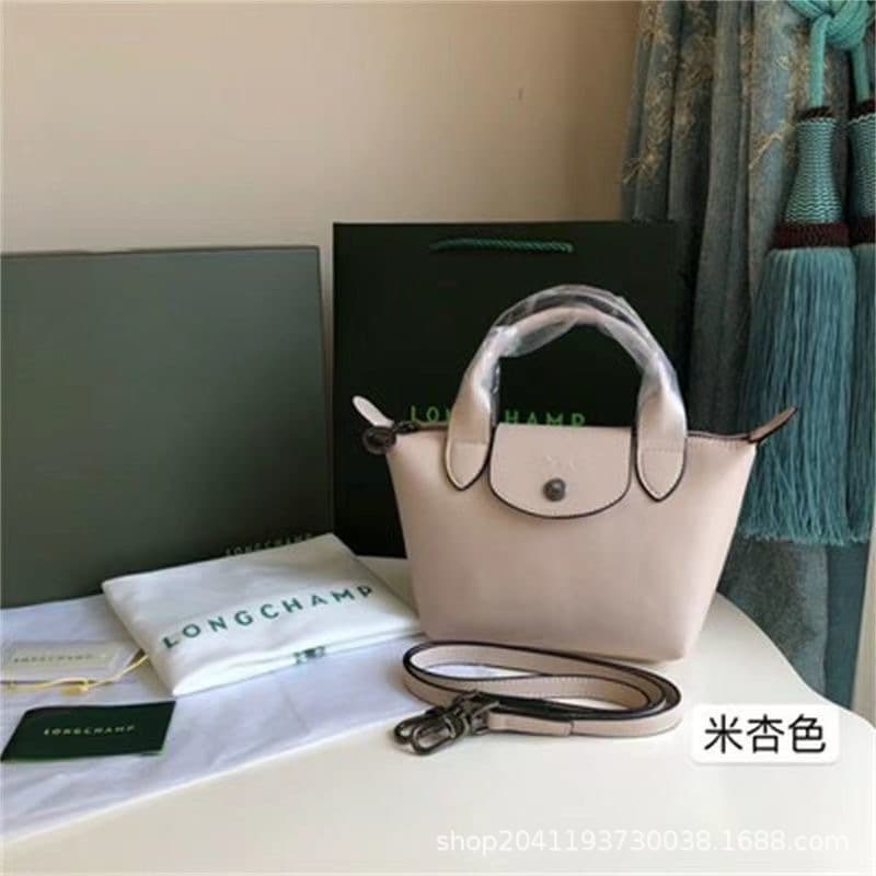 Dragon-embossed lambskin mini dumpling bag, shoulder crossbody bag, mini handbag, fashionable, versatile, and lightweight women's bag