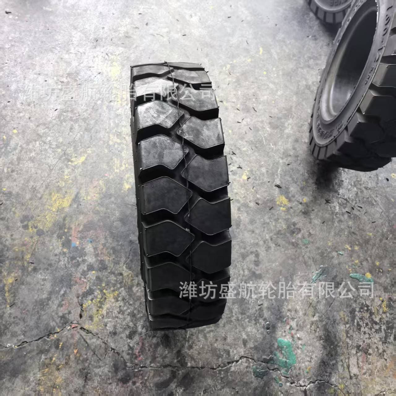 Double Coin Heli industrial solid forklift tires 7.00-12, mine tread pattern, airless solid tires, model 700-12.