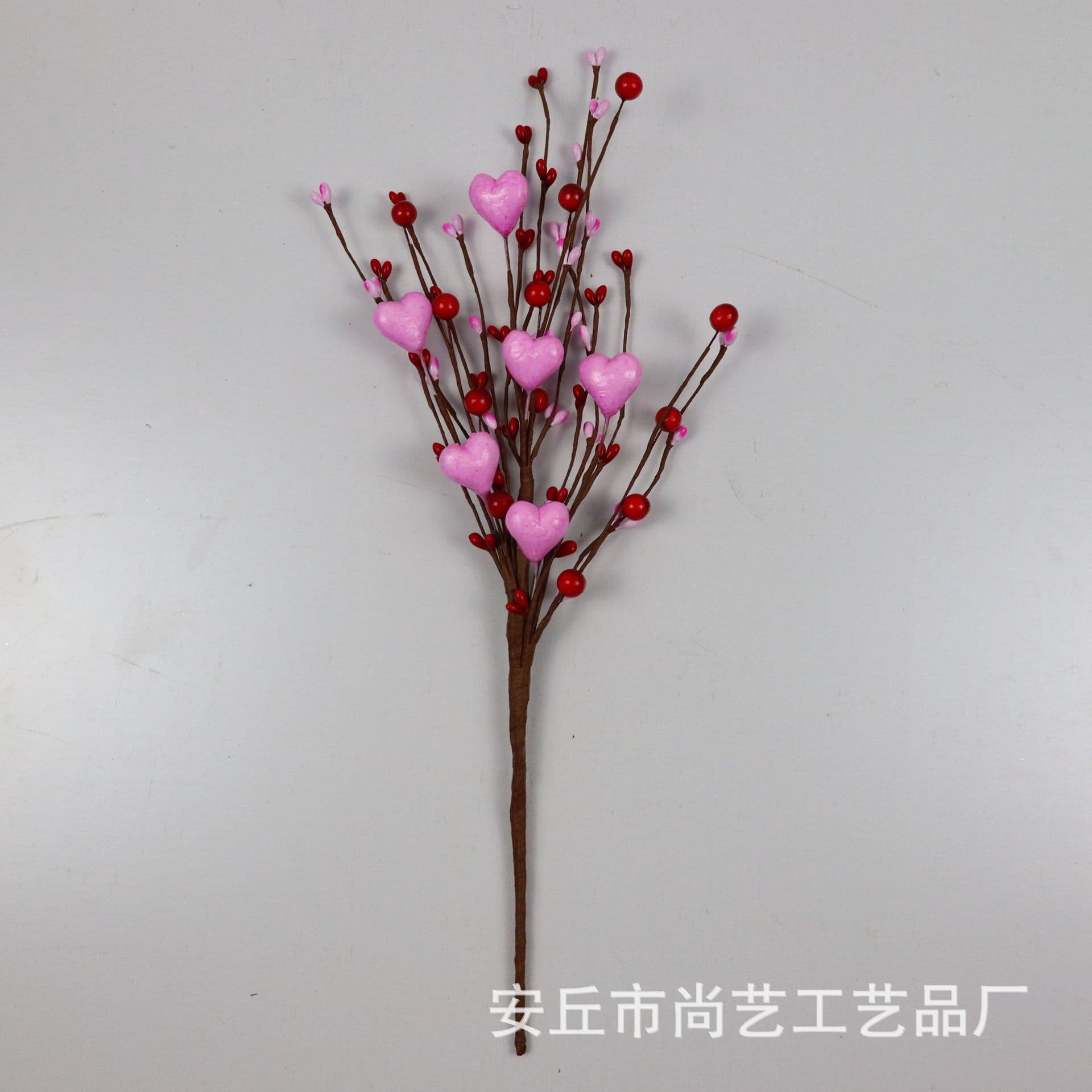 Amazon's best-selling American Valentine's Day gift accessory: Red berry heart-shaped branch home decor ornament.