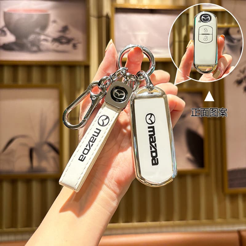 Suitable for Mazda Angkesela key cover CX4 Atez CX5 Ma 3 creative car key bag buckle protection