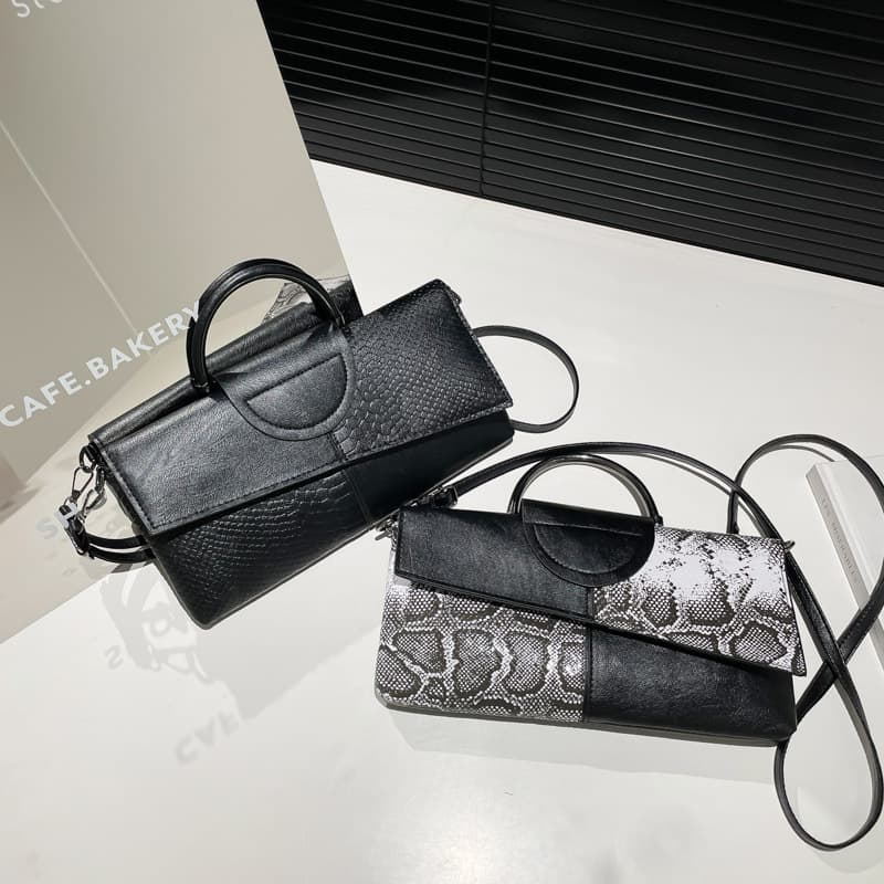 Spliced large-capacity 2025 new summer style fashionable and casual soft-surface large-capacity temperamental casual hand-held crossbody bag
