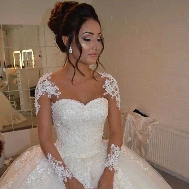 Cross-border wholesale pickup new bride skin color mesh long sleeve flat embroidered lace round neck floor-length foreign trade wedding dress