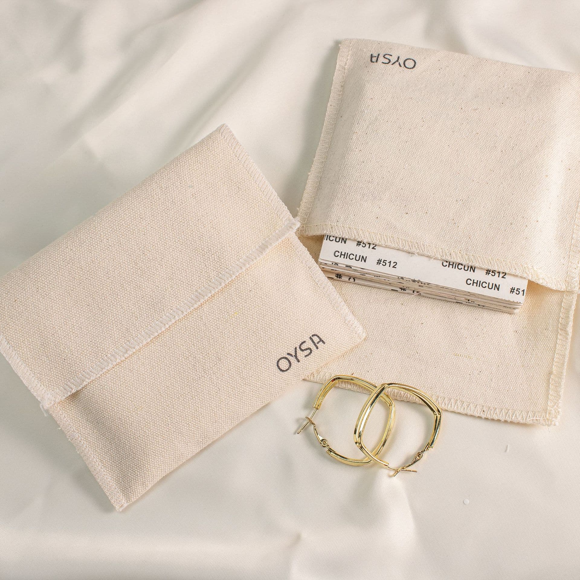 Logo-printable cotton envelopes/flip-top bags with overlocked edges to prevent fraying; dustproof jewelry packaging and storage bags.