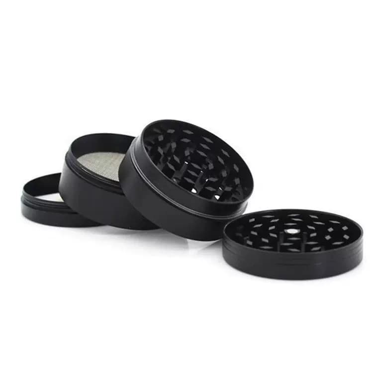 Hot-selling flat zinc alloy four-layer tobacco grinder, magnetic metal tobacco and spice grinder.