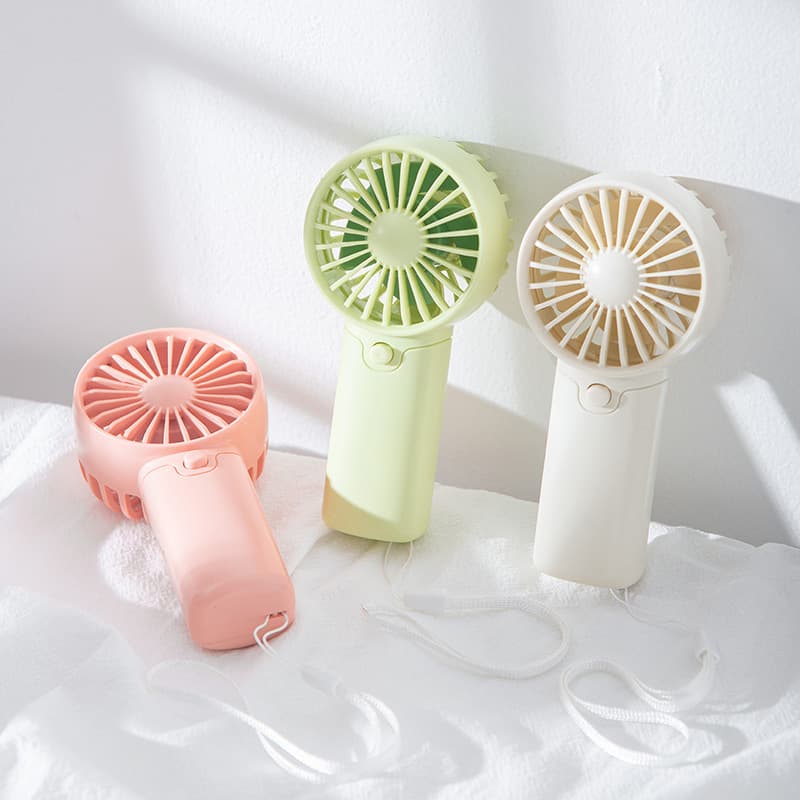 Mini silent fan for summer, suitable for students and offices, removable battery, rechargeable, handheld fan with lanyard.