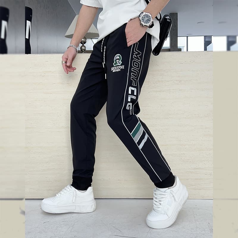 Quality trendy European goods thin webbing splicing embroidery jacquard trendy men's casual pants black white green M-4XL