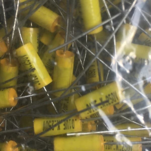 Axial film capacitor 103 0.01uF 10K 0.01k 250V; Non-polar feedthrough capacitor, yellow round 11*5