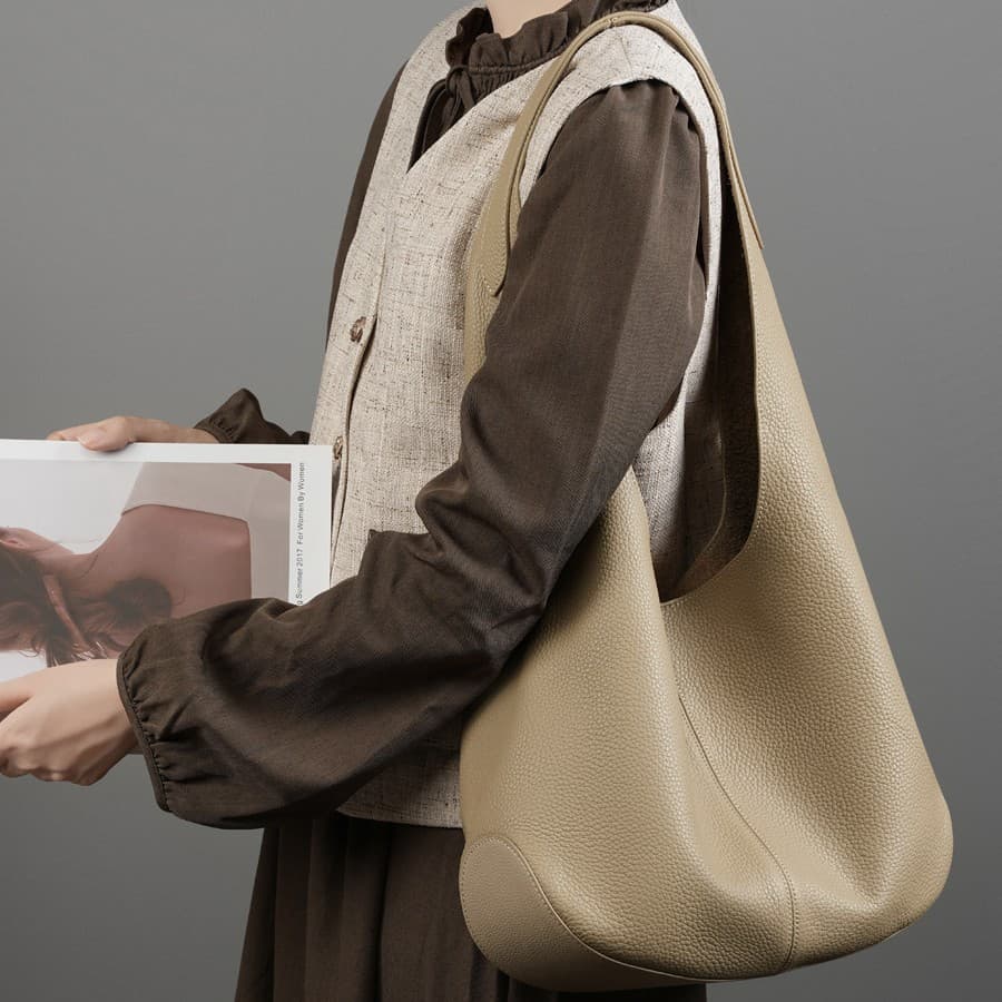 New Korean internet celebrity women's bag bucket bag large capacity first layer leather tote bag high-end armpit single shoulder genuine leather bag