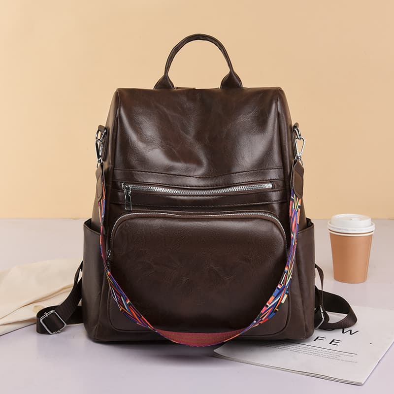 PU soft leather cross-border backpack, large capacity, new cross-border women's bag, anti-theft, simple travel bag, lightweight and casual schoolbag.