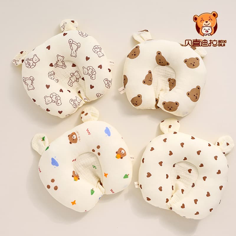 Anti-flat head shaping pillow for newborns, made of pure cotton, soft and breathable, suitable for babies aged 0-12 months.
