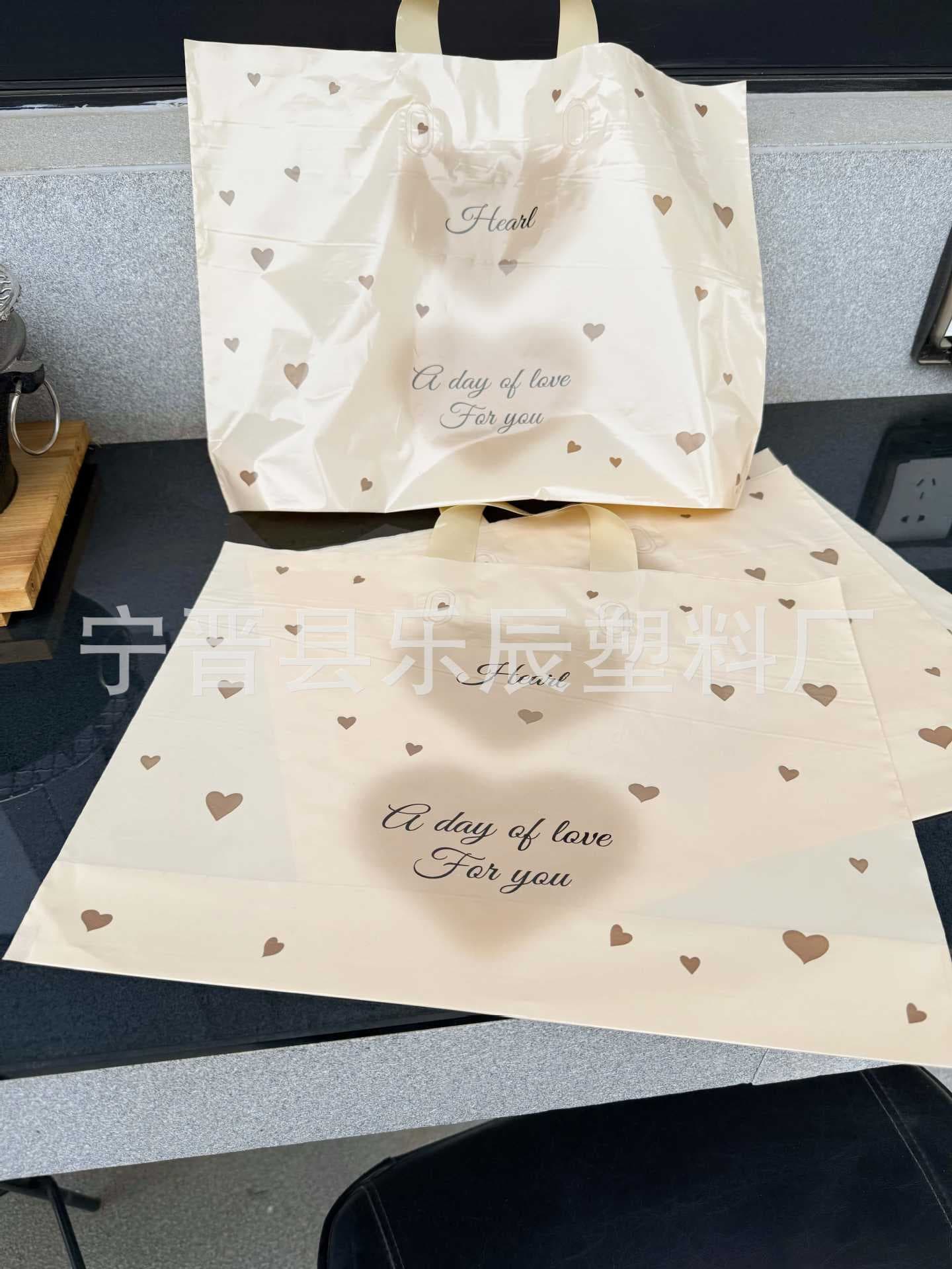 Cross-border clothing store bag custom LOGO clothes packaging bag 2026 Year of the Horse new plastic clothing handbag