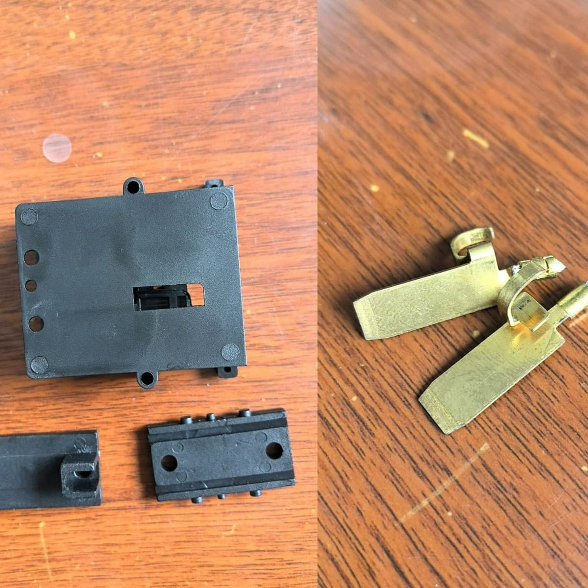 Wire harness components, black plastic shell with copper pieces.
