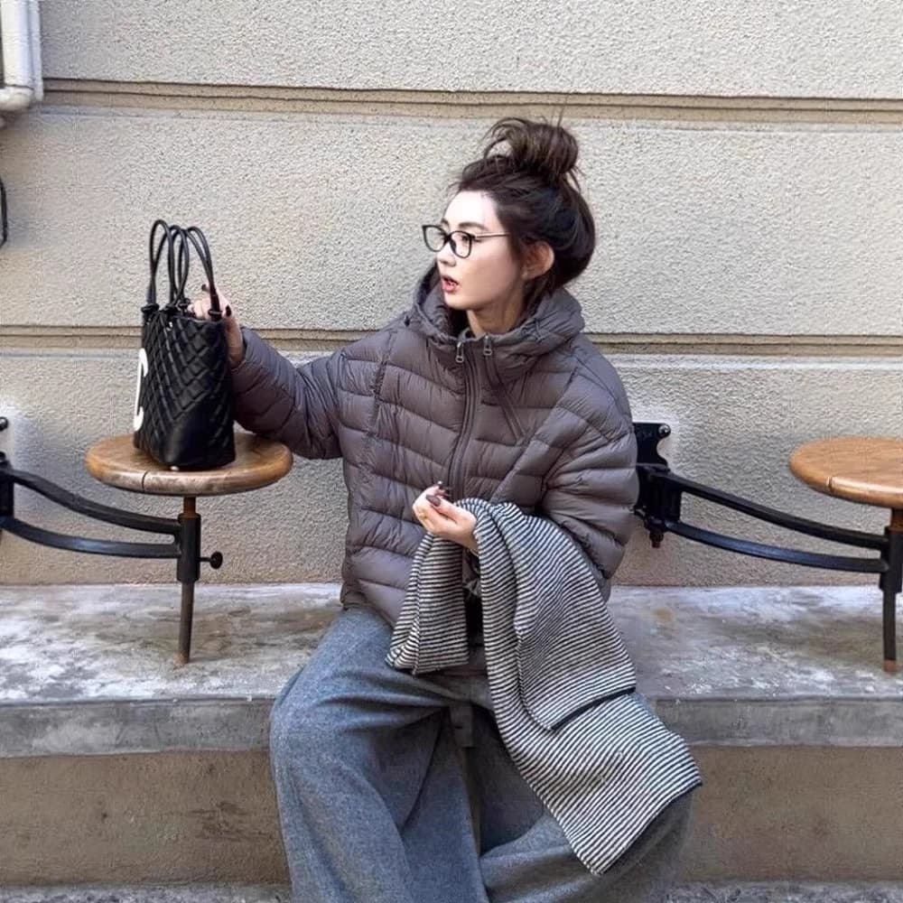 Super nice gray hooded warm quilted jacket for women. Unique and beautiful loose cotton jacket for autumn and winter wear.