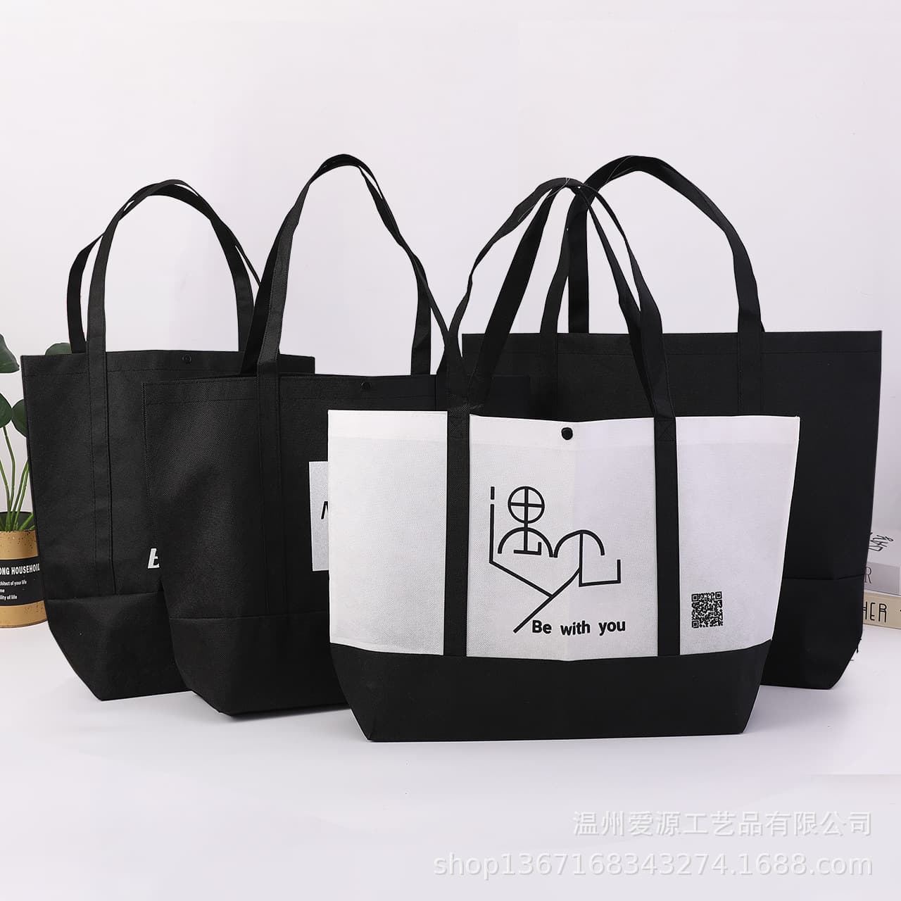 Custom non-woven tote bags with shoulder straps, black and white options, printable logos, sewn bags for clothing stores, eco-friendly.