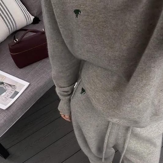 A casual gray sweater and knitted trousers set for women, perfect for late autumn and a Korean-style look.