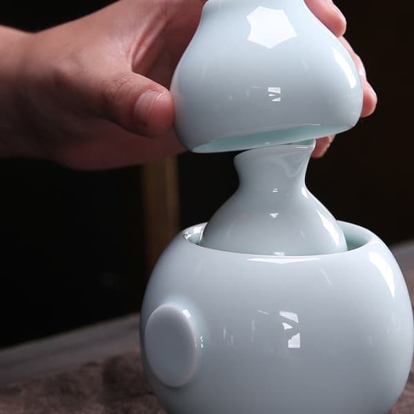 Home ceramic wine warmer for two taels of white or yellow rice wine, traditional heating set for spirits.