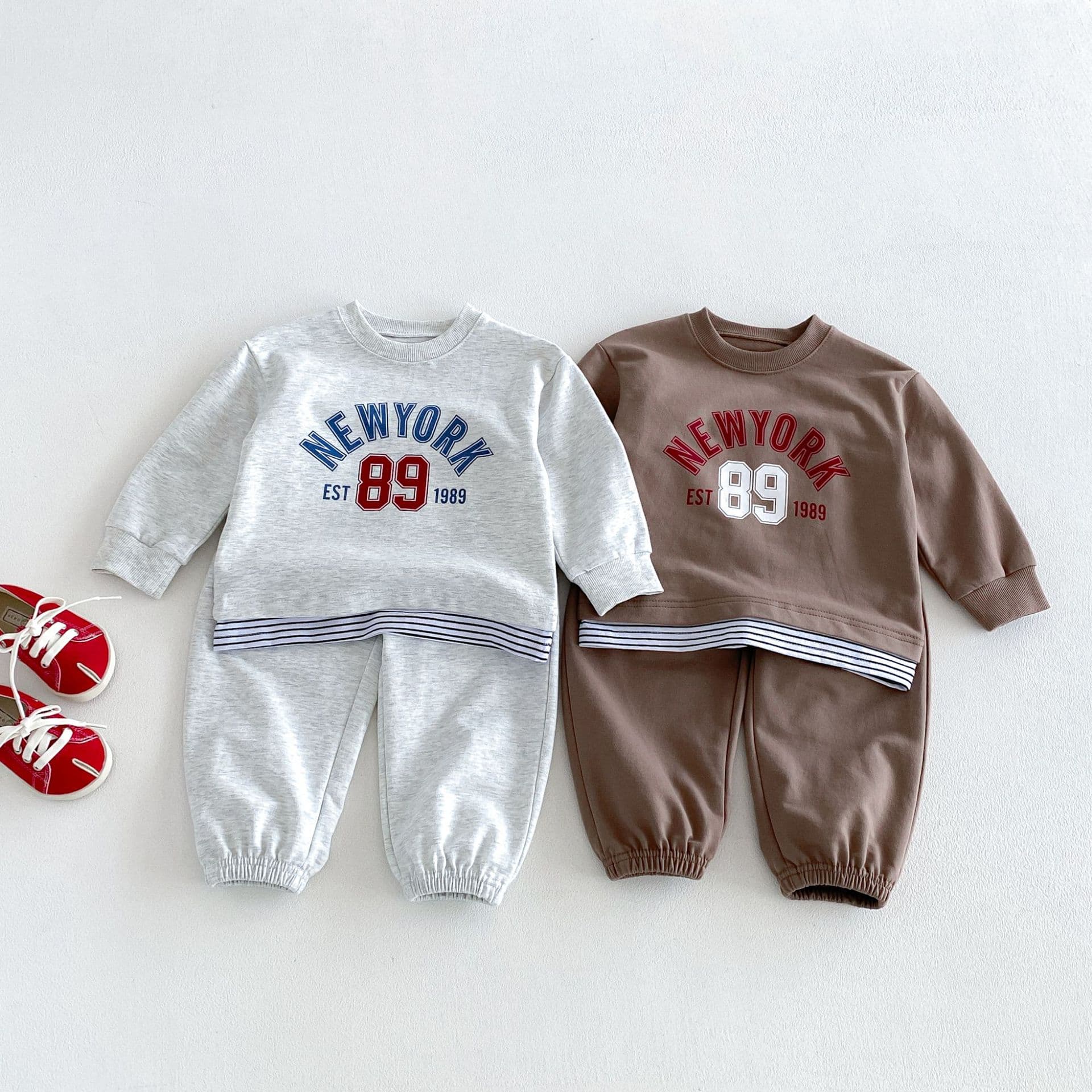 2026 Autumn Children's Suit Korean Version Fake Two-piece Boys' Sports Long-Sleeved Sweatshirt Girls' Spring and Autumn Casual Clothes