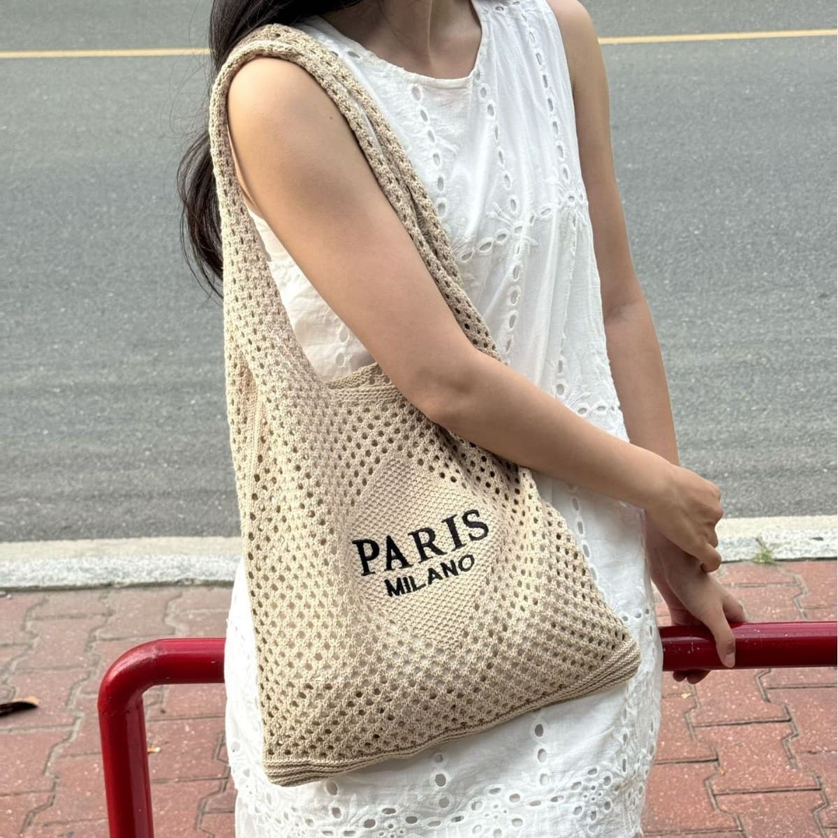 Hand-held women's bag woven casual fashion hollow Japanese and Korean letters embroidered hand-held shoulder bag light luxury new beach bag