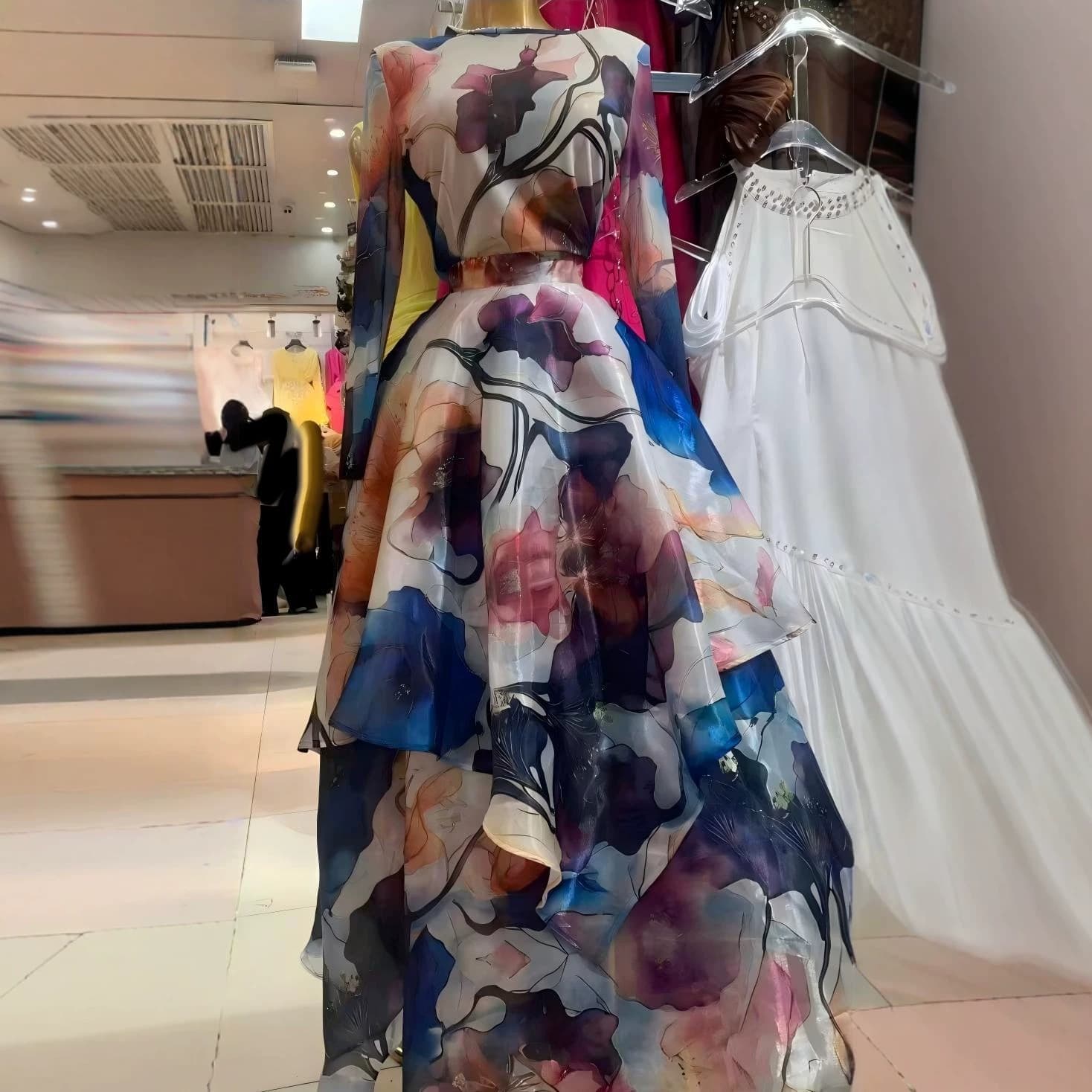 Spring and Summer New Printed Long-Sleeved Top + Waist-Length Skirt Set