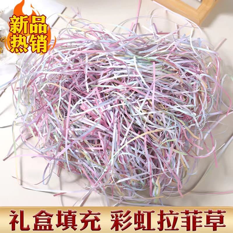Factory direct wholesale of rainbow raffia colorful paper shreds for gift boxes, candy boxes, and fillings. Large stock of shredded paper available.