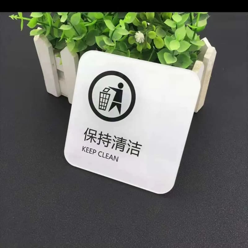 There is a monitoring acrylic sign inside, a warning reminder that you have entered the area, a self-adhesive sign, and a monitoring area sign.