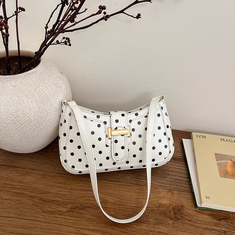 French retro polka dot armpit bag for women 2026 summer new style simple baguette bag niche versatile shoulder bag