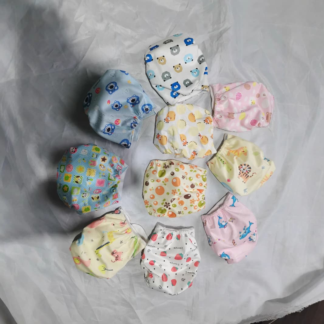 Autumn and winter baby fleece diaper pants breathable isolation pants infant cartoon washable adjustable diaper fixing pants