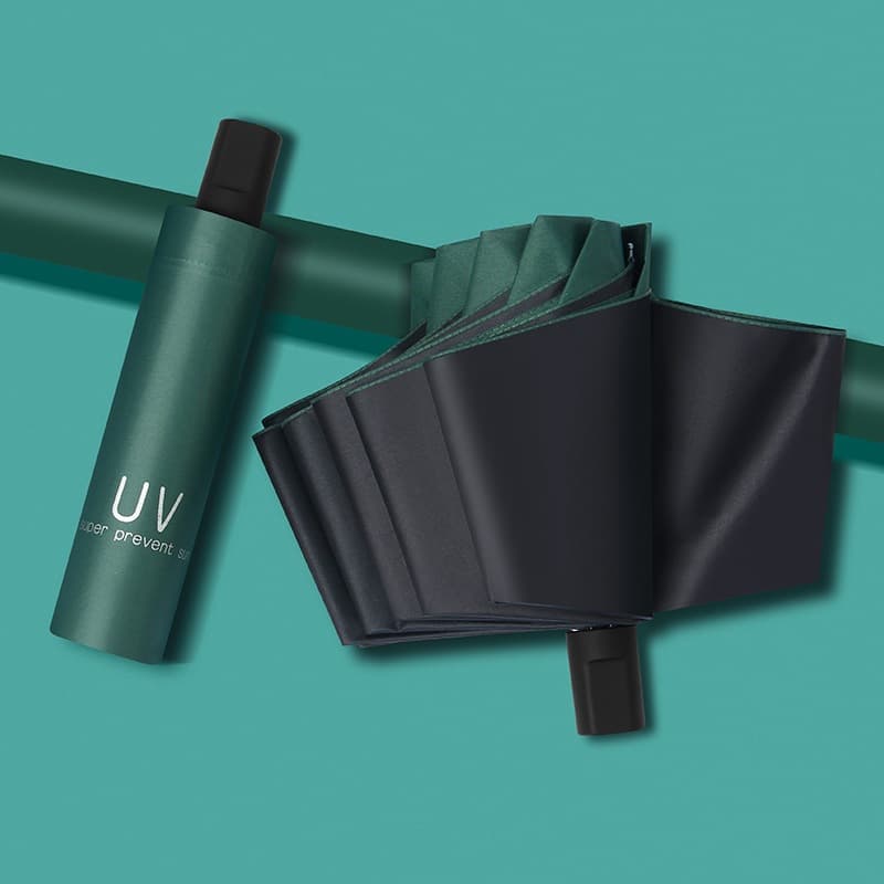 Creative UV folding umbrella bulk wholesale, black coating sun protection, sun and rain dual-use, manufacturer in stock.