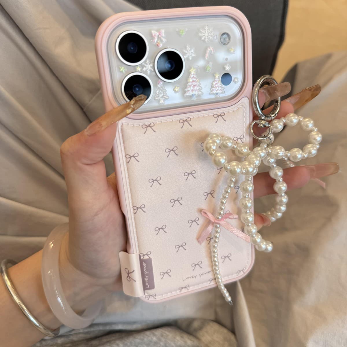 Bulge bow suitable for Apple 17pro mobile phone case 17promax girly pearl protective cover 16/15 anti-fall
