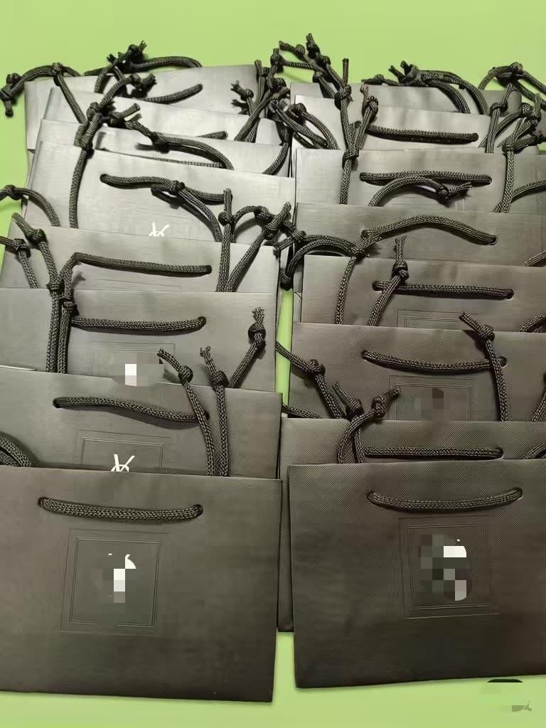 YSL original boutique tote bag, perfume, lipstick, eye cream, toner, serum, cushion gift bag