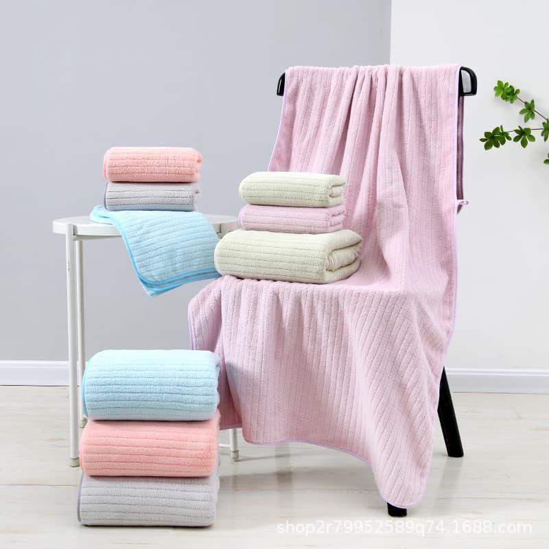 Factory direct sales of coral fleece bath towels, wholesale absorbent and quick-drying towel sets, extra thick beach towels, extra thick coral fleece.