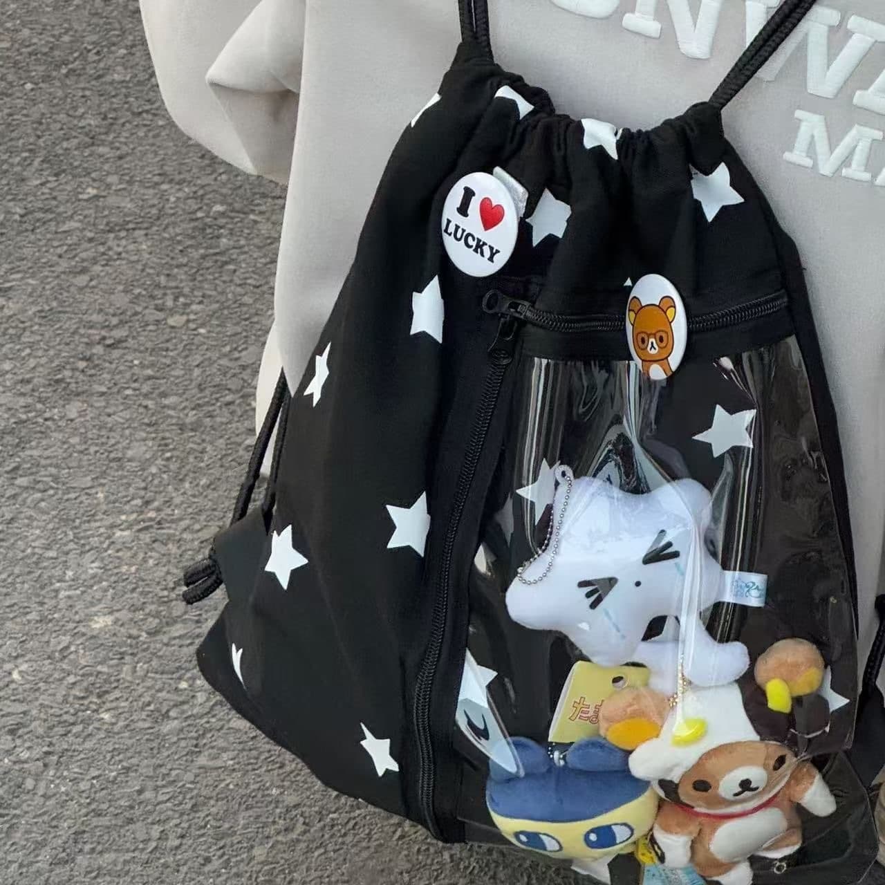 Star-pattern drawstring backpack with wide straps, large capacity "itabag" for commuting, student daypack for girls.