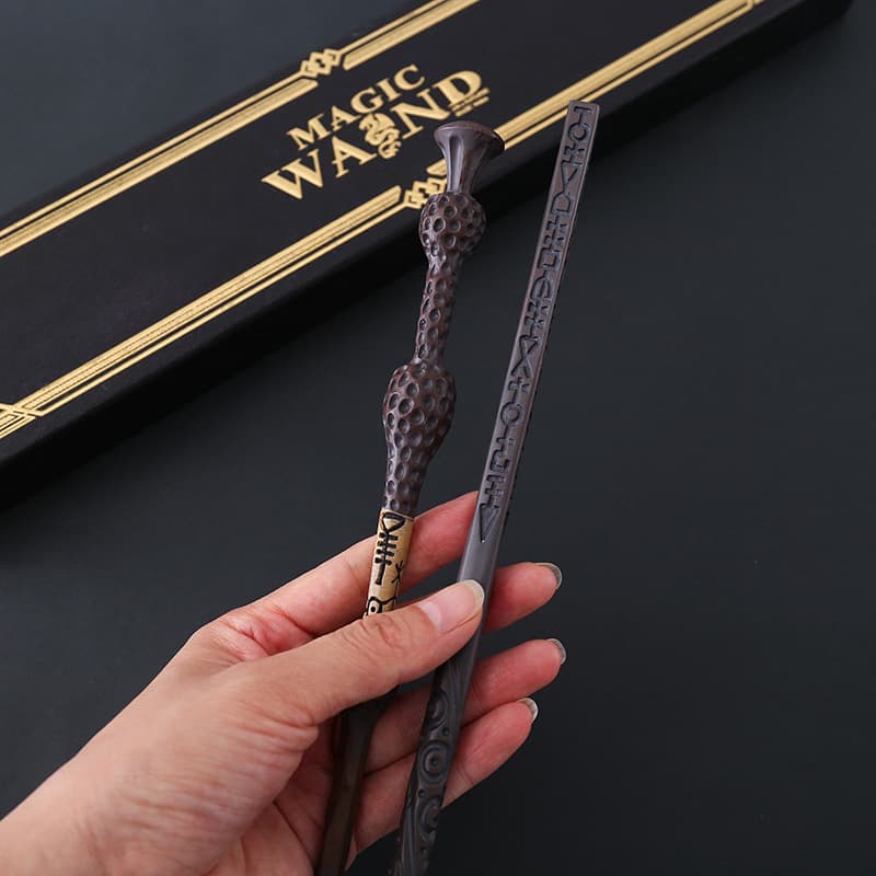 Harry Potter Hermione, Dumbledore, Eddie Redmayne, wands, magic wands, and related merchandise in a black box.