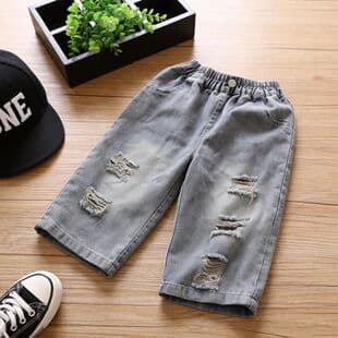 Fashionable Korean-style ripped jeans for boys and girls, loose straight-leg pants for spring and autumn, trendy kids' wear