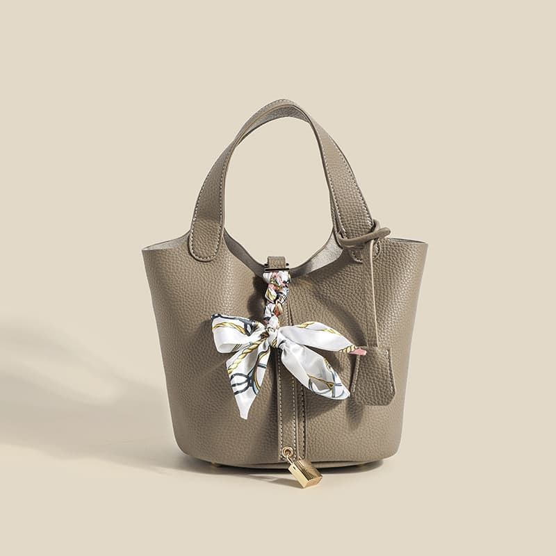 2026 Spring New Trendy Women's Bag Commuter Fashion Handheld Bucket Bag Solid Color Basket Bag with Scarf Pendant Handbag