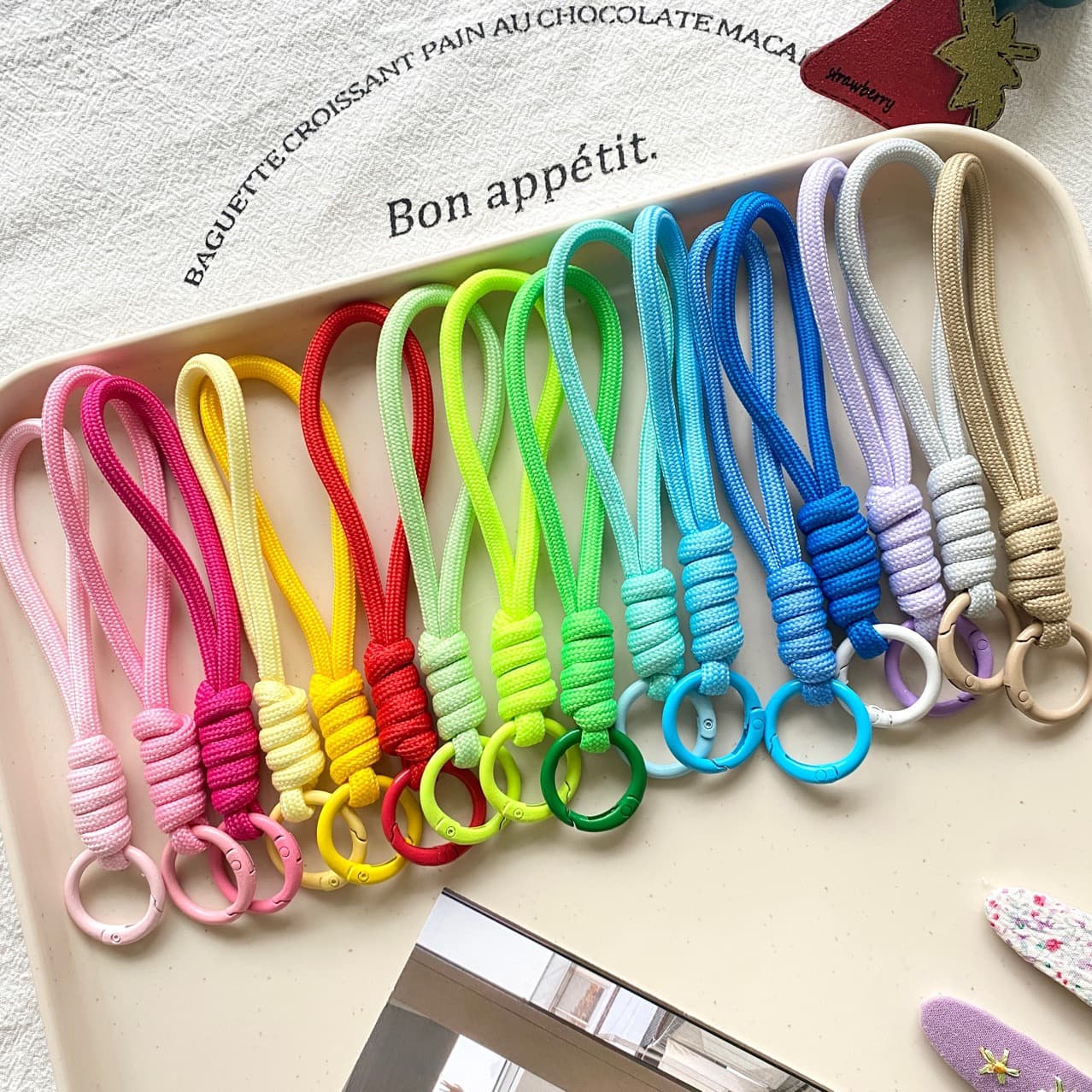 Colored knot braided phone lanyard creative short wrist lanyard phone case keychain detachable anti-loss.