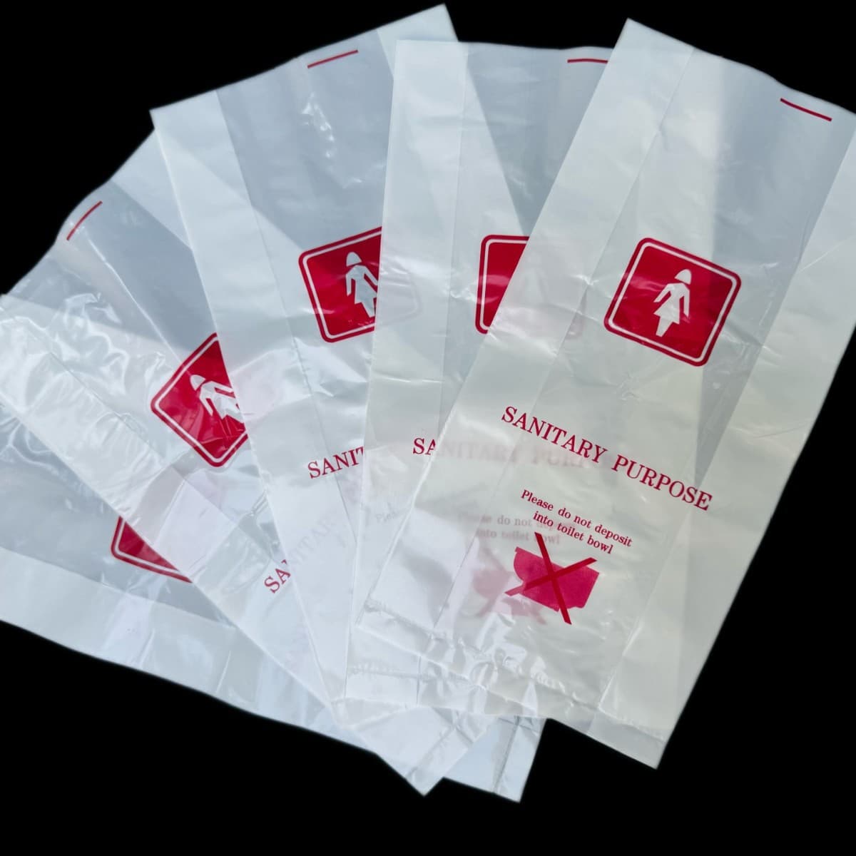 500 disposable plastic sanitary bags per bundle for hotel guest rooms, extra thick and designed for women's use.
