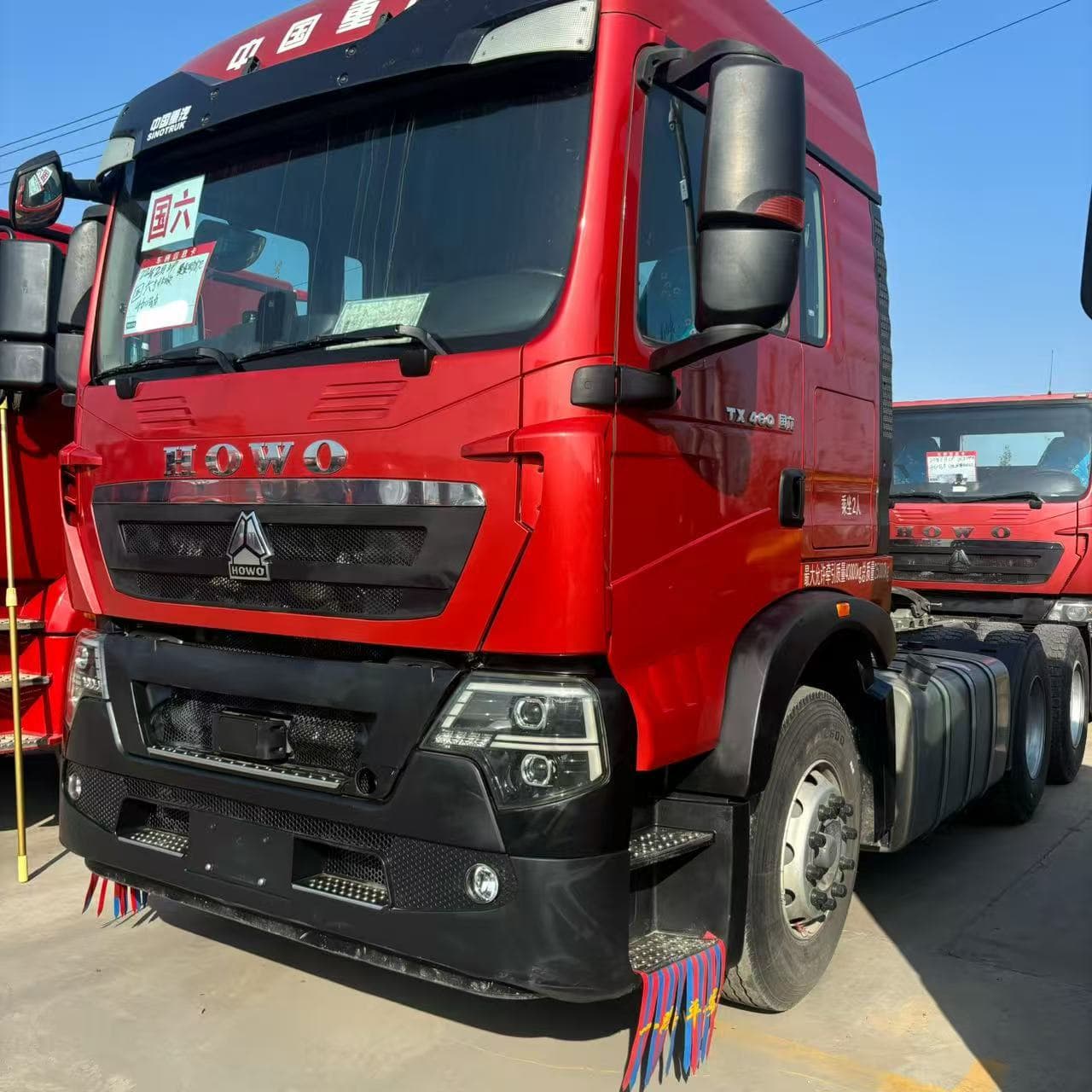 Cross-border supply of Sinotruk HOWO TX 460 tractor semi-trailer transport dual-drive HOWO heavy truck