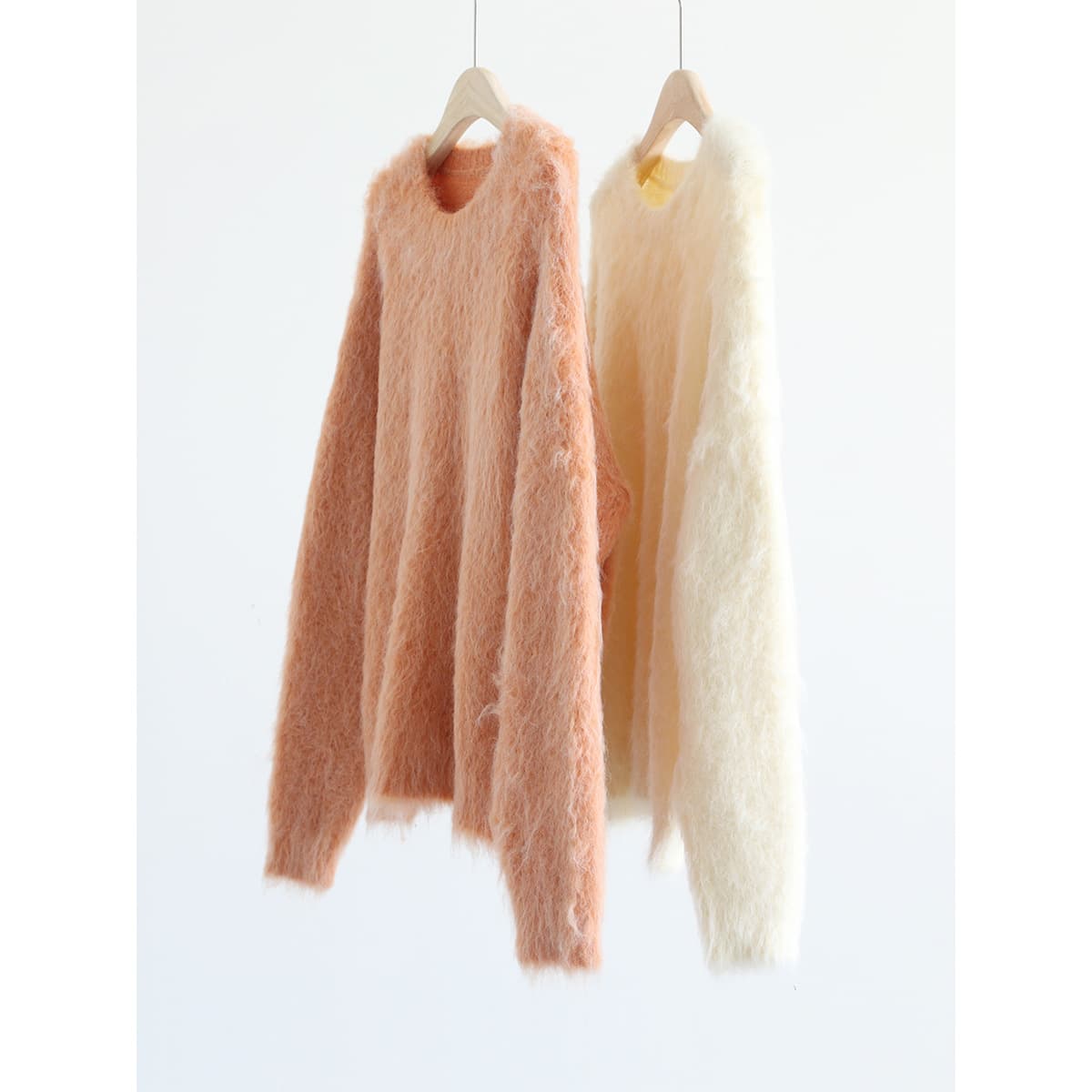 Korean order autumn and winter warm heavy wool brushed long hair round neck knitted loose pullover thickened sweater for women