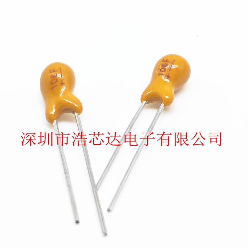 Through-hole tantalum capacitor, 25V, 10uF (106H), lead spacing 2.54mm.