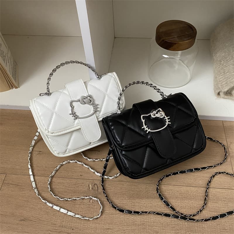 Sweet and cool kitten chain handbag metal hollow cat head girl versatile one-shoulder cross-body mini square bag