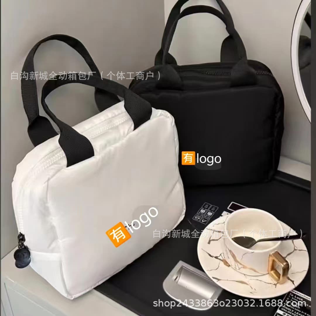 Trendy brand camellia handbag ins small fragrance down cotton cosmetic bag women's large capacity convenient washing storage bag