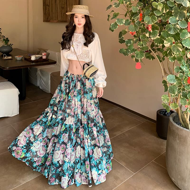 High-quality elegant lady wears white hollow shirt printed skirt suit for seaside vacation