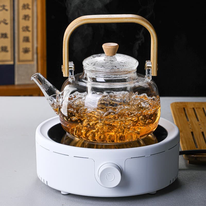 Stove tea brewing manufacturer wholesale, handle glass teapot, heat-resistant boiling and steeping pot, health tea for Pu'er and white tea.