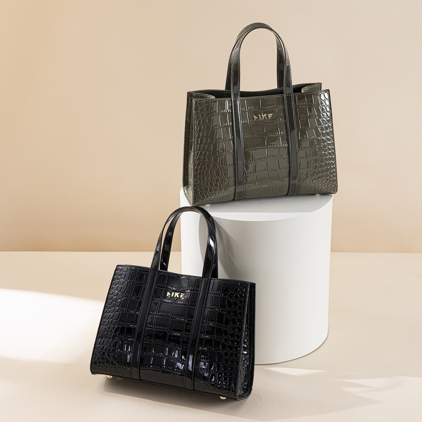 MKF bright patent leather crocodile pattern portable briefcase for women with simple vertical strip design for work and commuting single shoulder crossbody bag for women