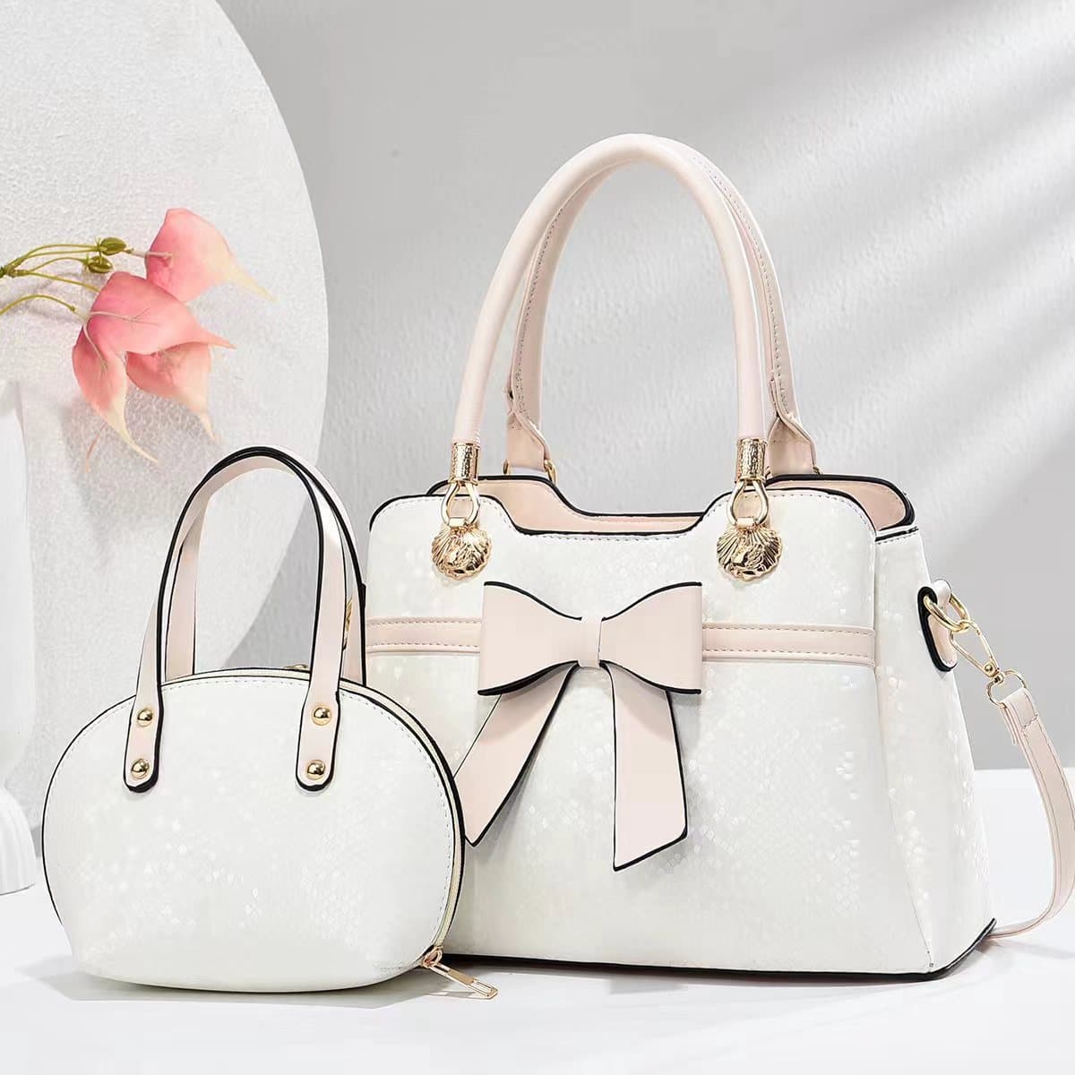 Handbag bag, bow knot bag, snake pattern foreign trade women's bag, textured shoulder crossbody bag, cross-border wholesale bags