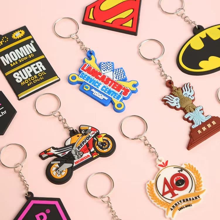 3D PVC soft rubber figurine keychains drip plastic rubber keychains custom enterprise IP logo pendants